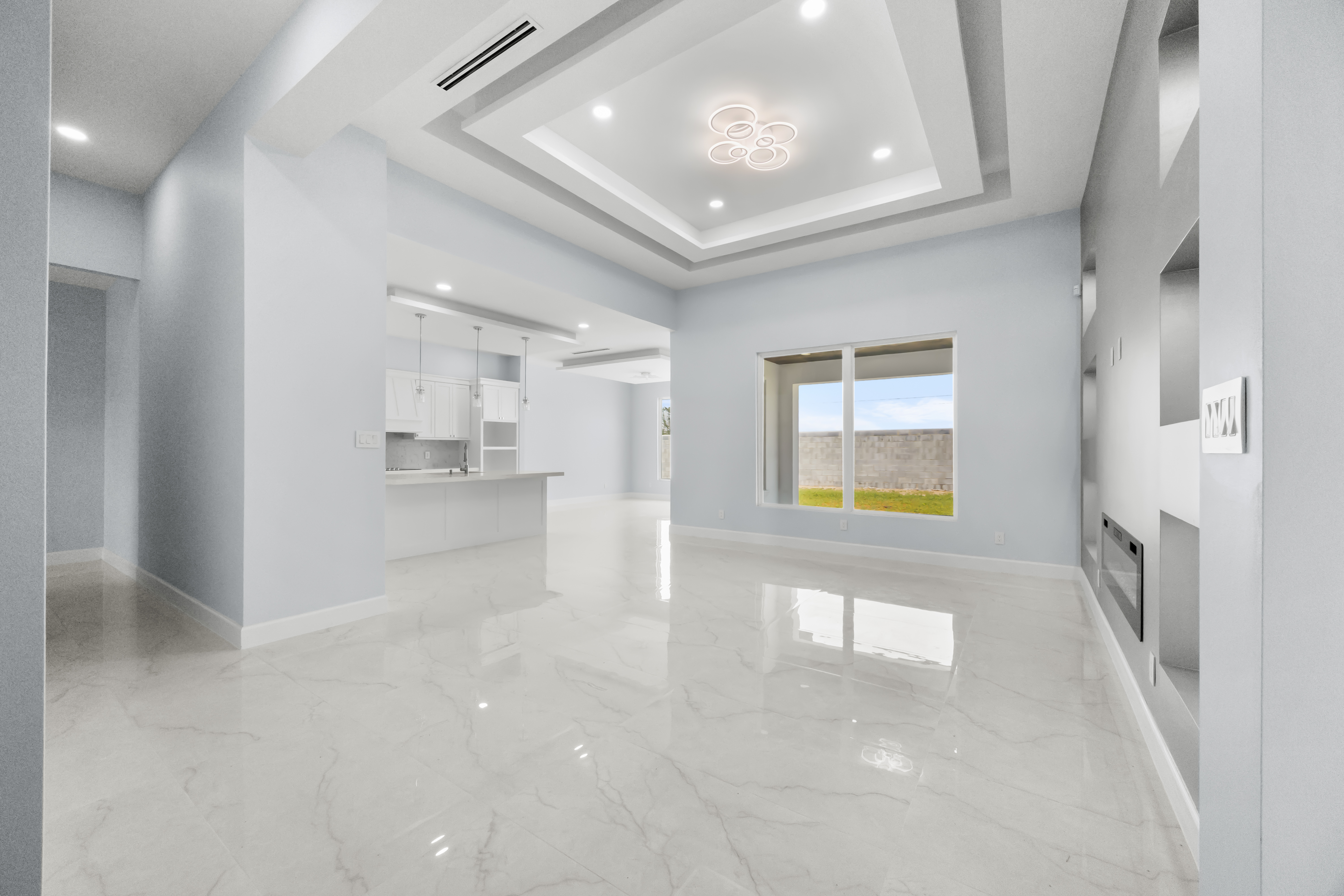 Open-concept living area looking toward the kitchen