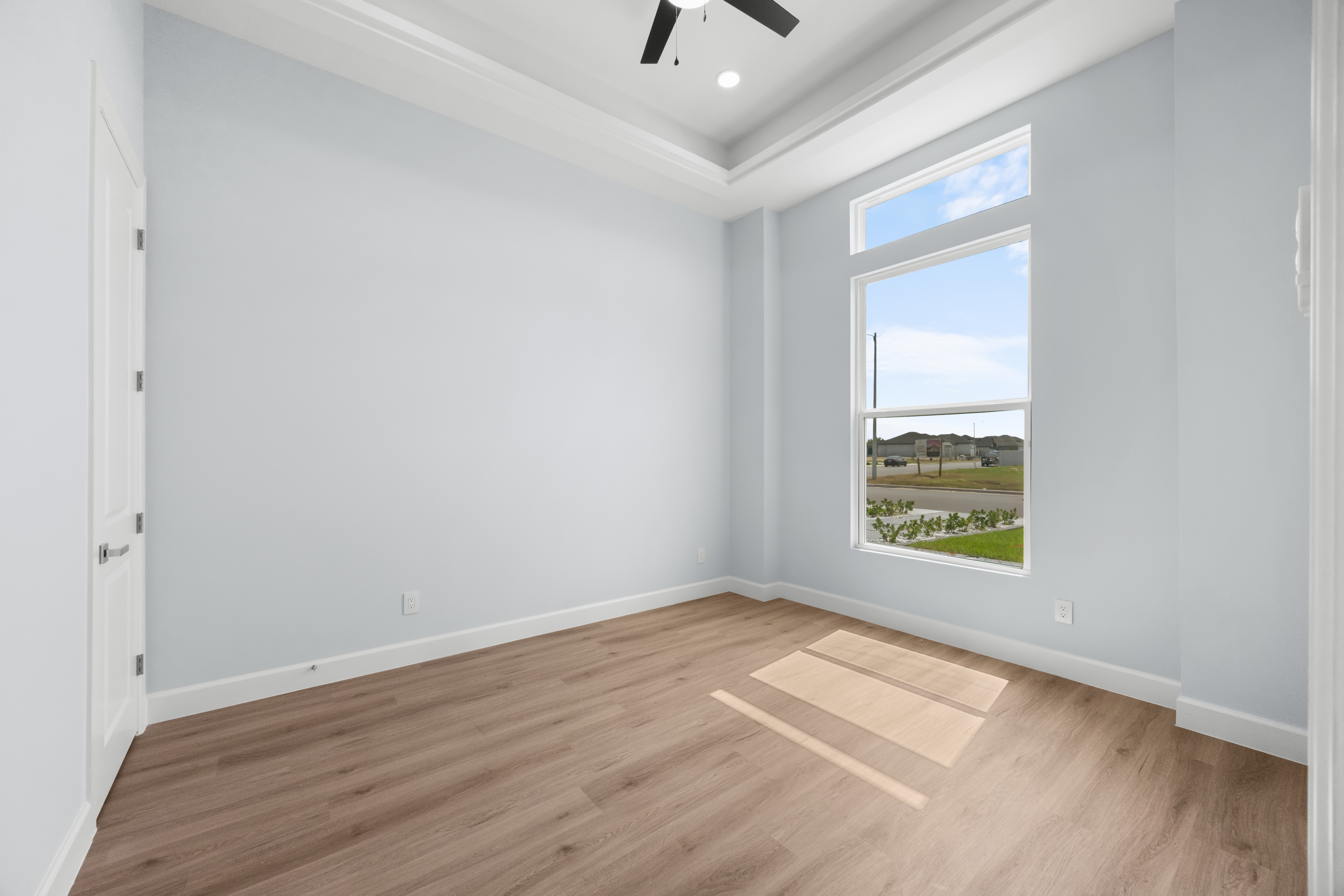 Guest bedroom with large window