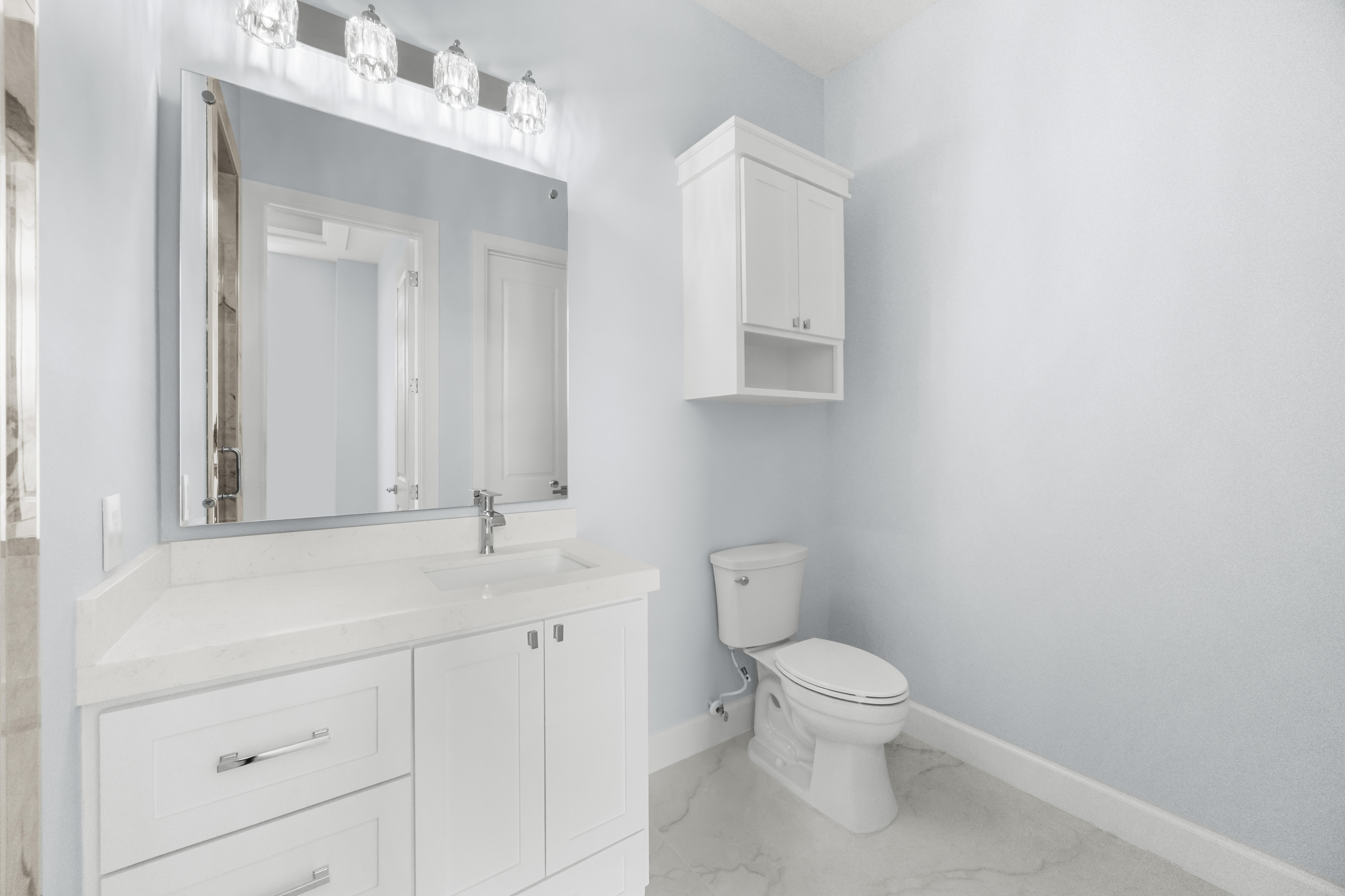 Secondary bath vanity and toilet